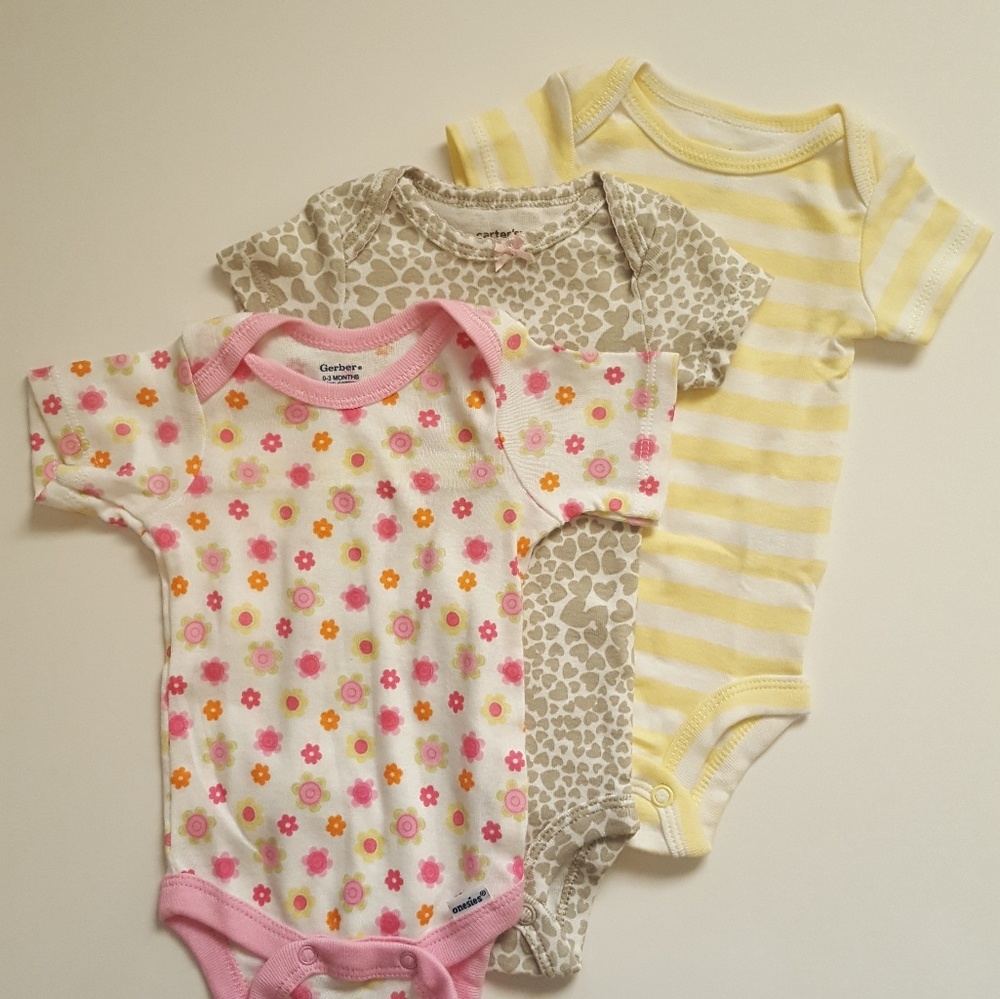 Bundle of newborn onesies